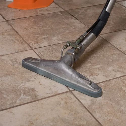 Professional tile and grout cleaning in progress